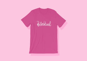 Hot pink shirt reads "Bitechtual" in white handlettered script