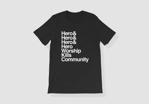 Black tee reads 'Hero& Hero& Hero& Hero Worship Kills Community'