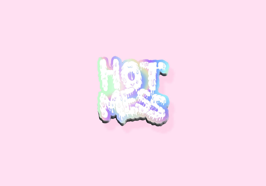 'Hot Mess' written in goopy handlettering on a cut-out sticker